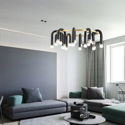 Modern black and gold u shape tube ring chandelier with curved metallic arms and exposed bulbs for dining room light