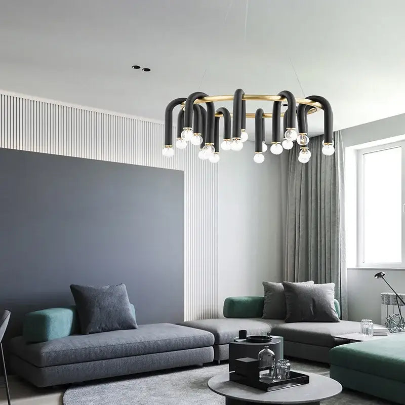 Modern black and gold u shape tube ring chandelier with curved metallic arms and exposed bulbs for dining room light