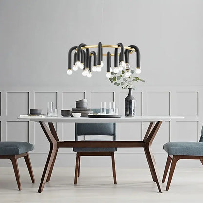 Modern black and gold u shape tube ring chandelier with curved arms and exposed bulbs for dining room lighting