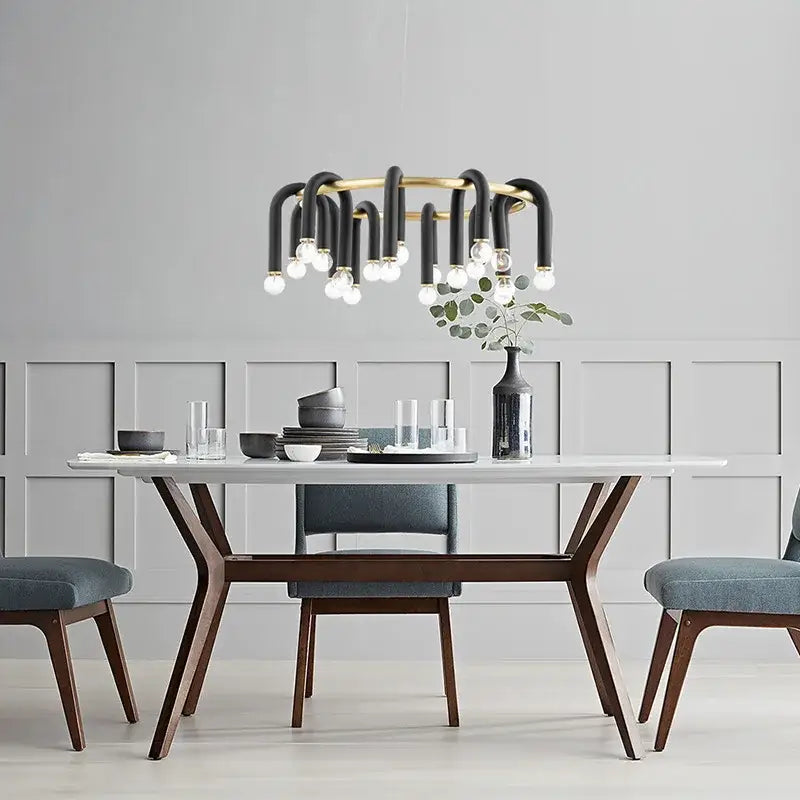 Modern black and gold u shape tube ring chandelier with curved arms and exposed bulbs for dining room lighting