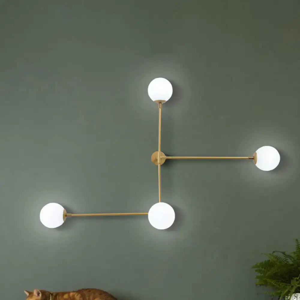 Modern black and gold wall lamp with four white glass shades direct wired electric for bedroom with modern design