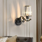 Modern black and gold wall lamp with clear glass faceted crystal shade for bedroom sconce lighting