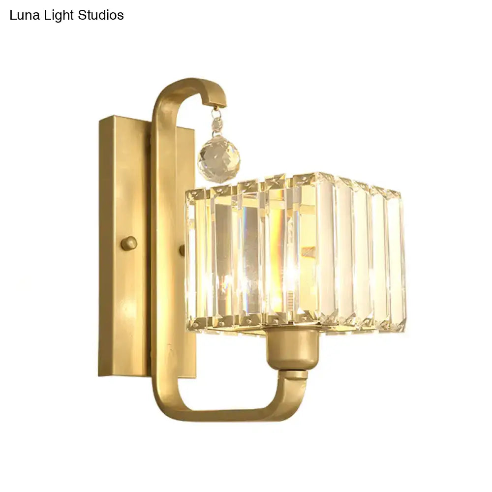 Modern black and gold wall sconce with rectangular crystal cage and faceted crystal shade for living room wall lamp