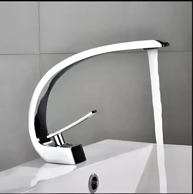 Modern chrome-finished basin faucet with sleek curved design and black accent details for decorbites black gold basin use