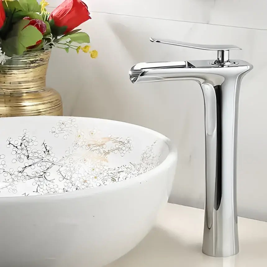 Chrome finished modern basin faucet with sleek tall design and single lever handle by decorbites gold waterfall bathroom