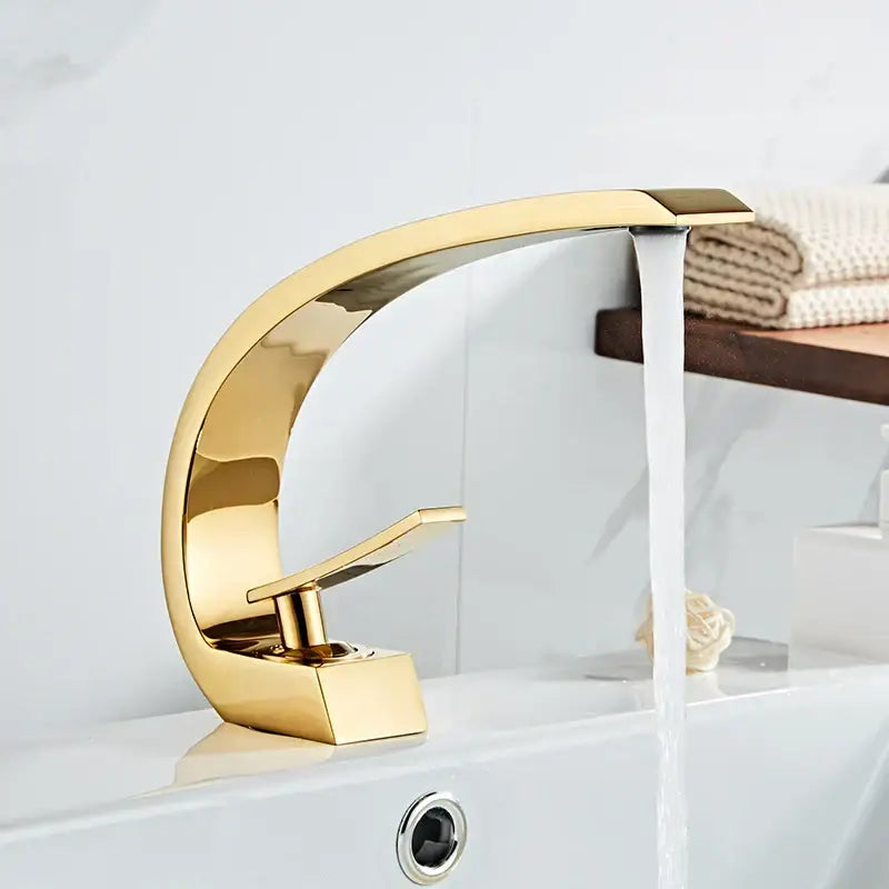 Gold-colored modern arched basin faucet with sleek metallic finish for decorbites black gold black gold basin design
