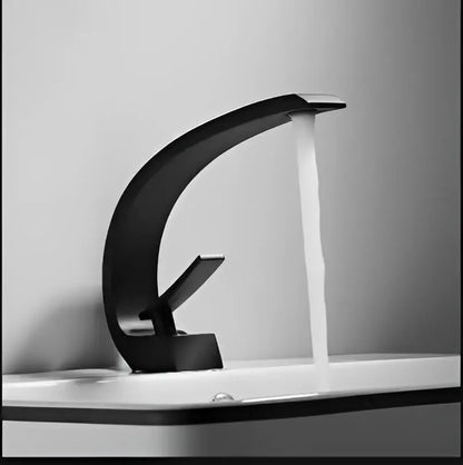 Modern black gold basin faucet with sleek curved design for bathroom decorbites black gold mixer tap