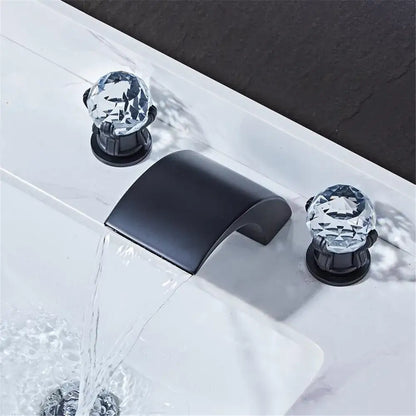 Modern black and gold waterfall basin faucet with black matte finish and crystal clear faceted knob handles decorbites black basin faucet