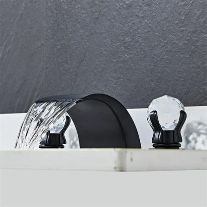 Modern black and gold decorbites black basin faucet with crystal accents and waterfall spout design for bathroom sink