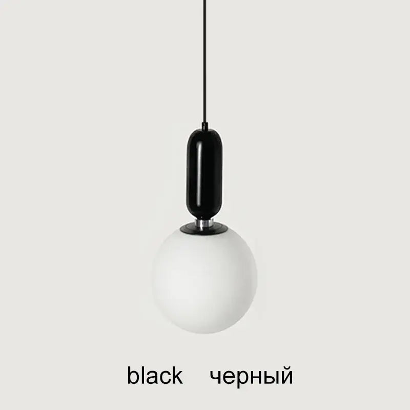 Minimalist black pendant light with a sleek cylindrical fixture and frosted white glass ball led chandelier decorbites glass ball