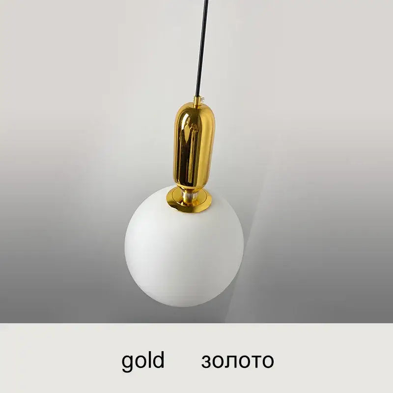 Modern black gold and white glass ball led chandelier featuring a polished gold metal fixture and opaque white glass globe decorbites glass ball