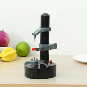 Modern black and gray electric peeler with red accents fruit slicer gadget for efficient kitchen fruit peeling and slicing