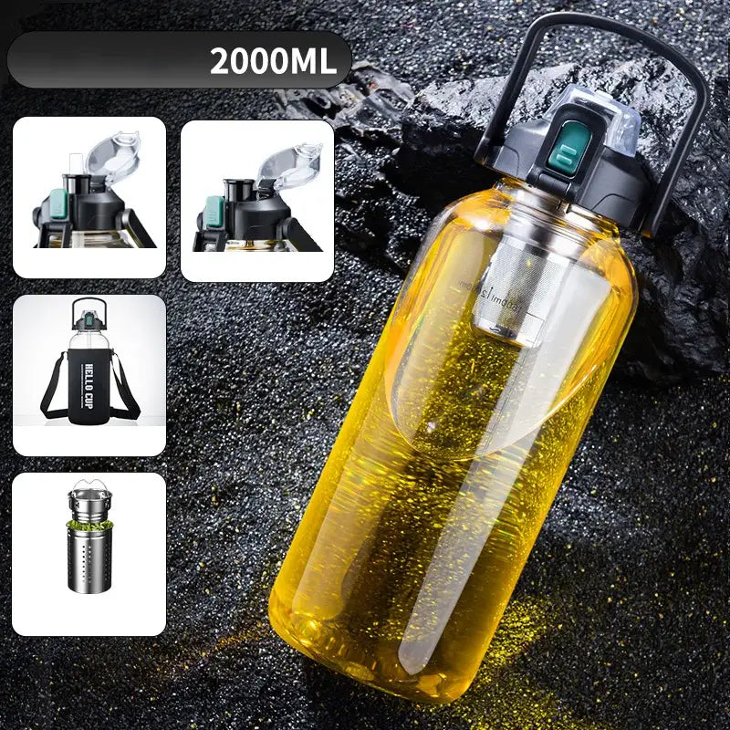 Transparent yellow 2000ml water bottle with black handle and lid featuring stainless steel infuser for decorbites glass cup use