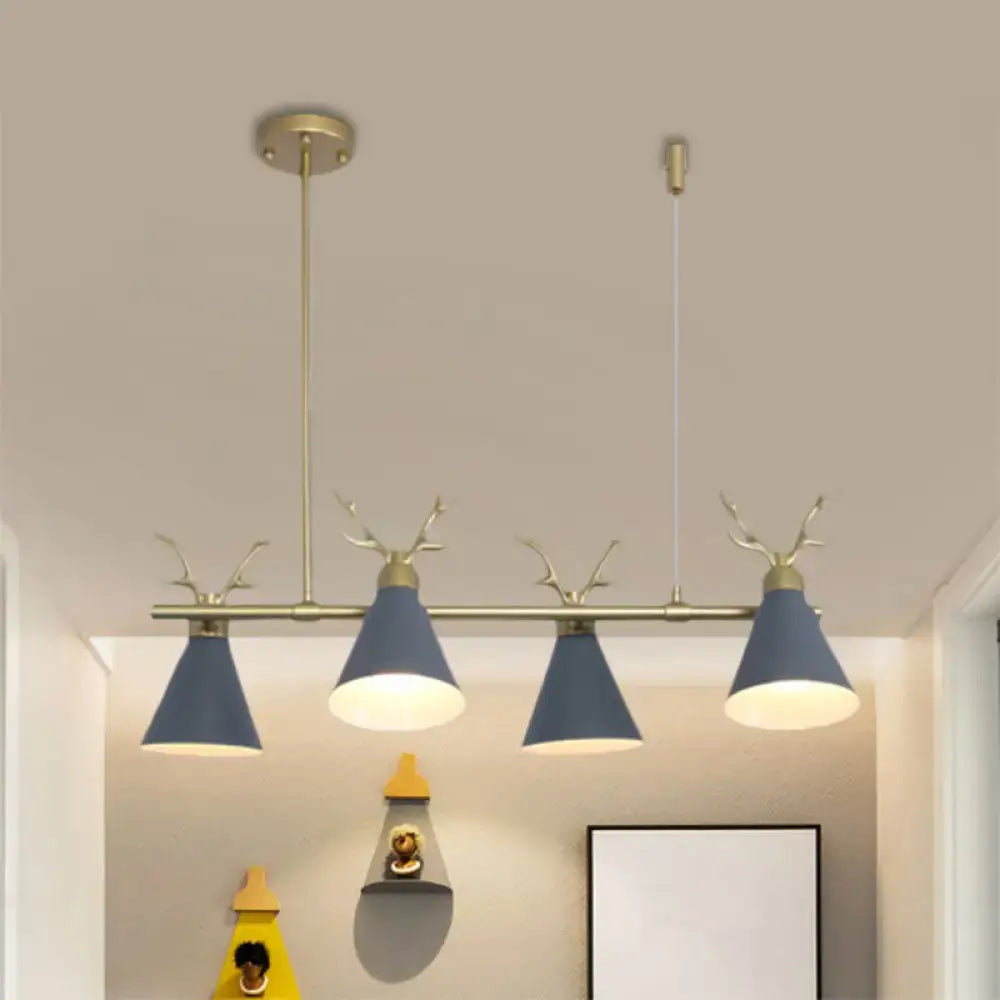 Modern brass-finished nordic chandelier with four navy blue conical shades and antler design in black grey white tones