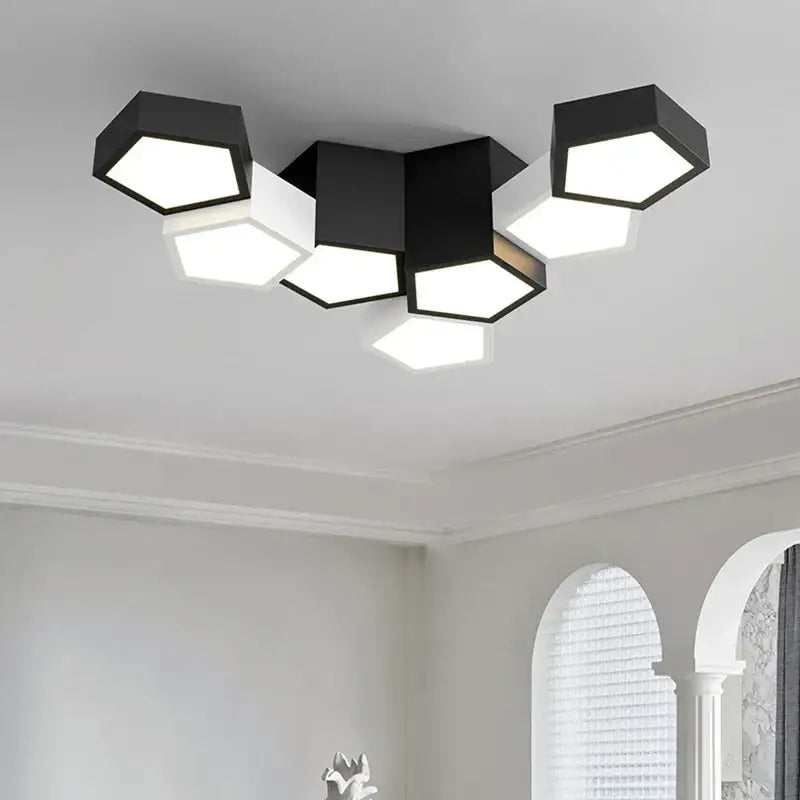 Modern black hexagonal geometric ceiling lamp with six illuminated panels ideal for master bedroom ceiling lamps decorbites