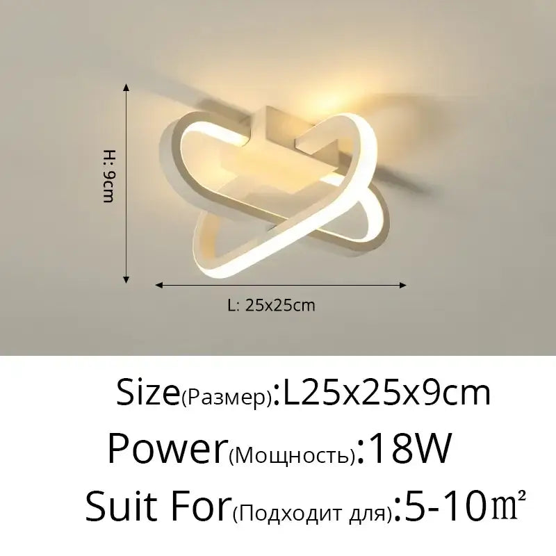 Modern white led wall sconce with sleek intertwined loop design complements decorbites elegant ceiling chandeliers