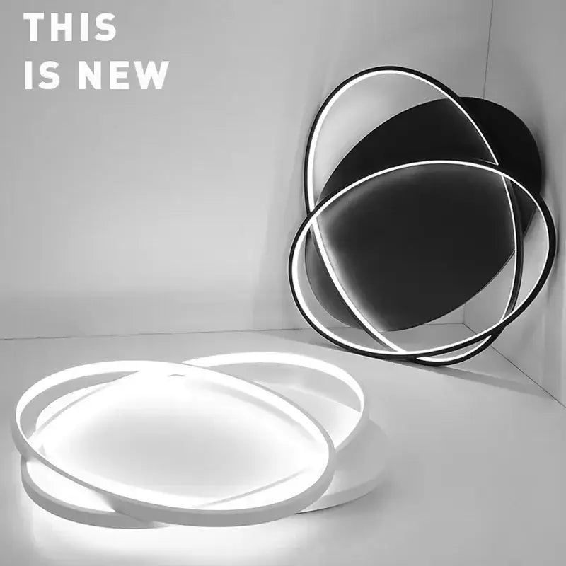 Modern black intersecting led ceiling light with sleek overlapping rings ideal for decorbites elegant ceiling decorbites elegant