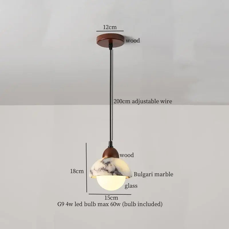 Modern pendant light with warm wooden mount and translucent white marble dome shade suspended by adjustable iron marble led wire