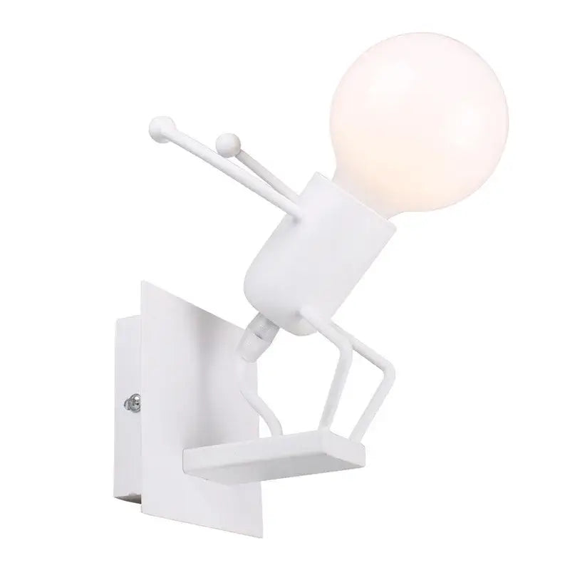 Modern black iron decorbites cartoon doll wall sconce with white figurine limbs and spherical bulb for kids bedroom decor