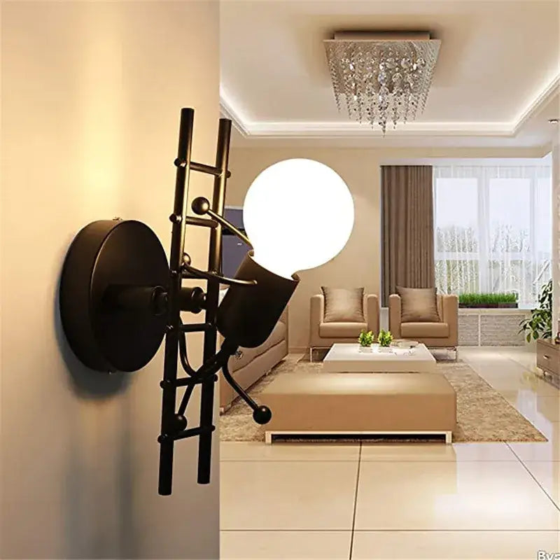 Black metal ladder-style wall sconce with a round white bulb for kids bedroom decorbites cartoon doll wall lighting