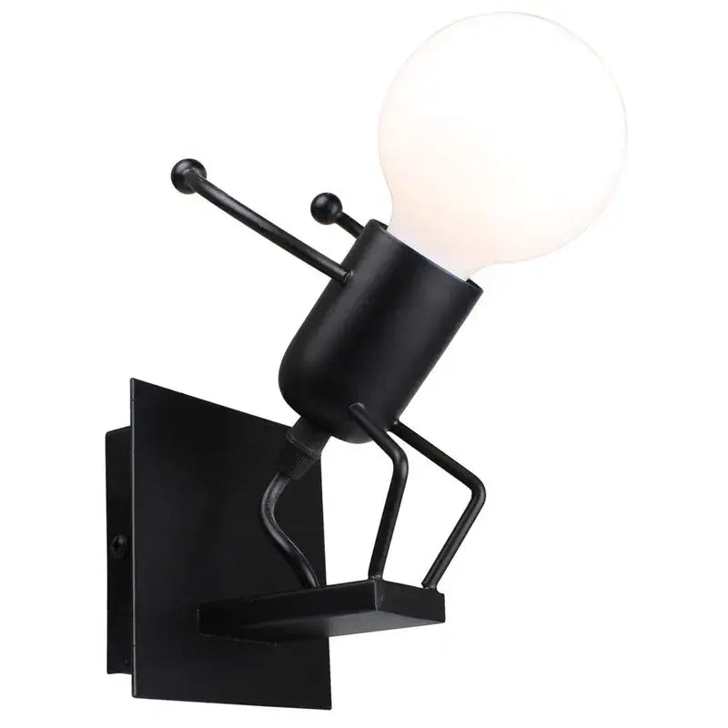 Modern black iron cartoon doll wall sconce with frosted glass bulb designed for kids bedroom decorbites cartoon doll wall