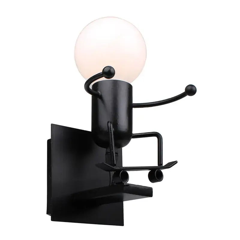 Modern black iron cartoon doll wall sconce with arms and legs designed for kids bedroom decorbites cartoon doll wall light