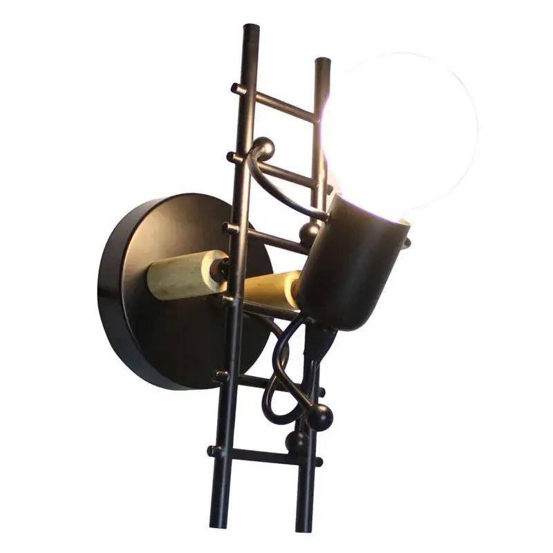 Modern black iron cartoon doll wall sconce with matte finish brass accents perfect for kids bedroom decorbites cartoon doll wall
