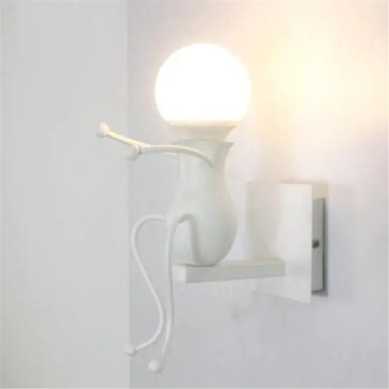 White ceramic wall sconce with spherical bulb and sculpted arm design for decorbites cartoon doll kids bedroom ladder light