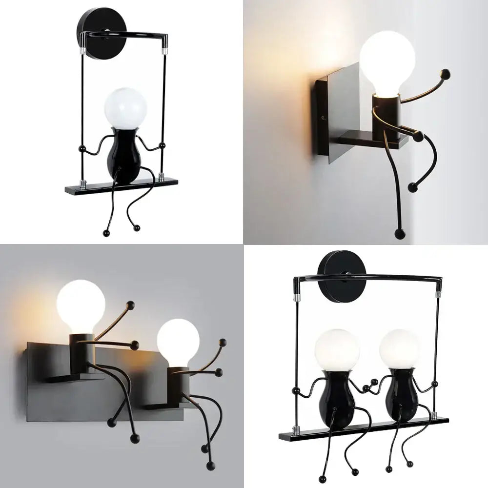 Modern black iron wall sconce with whimsical articulated figures holding glowing bulbs for creative led wall decorbites decor