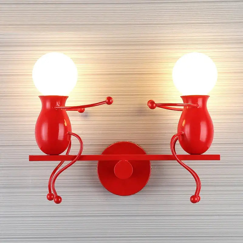 Red metallic wall sconce with two whimsical vase-shaped figures holding glowing bulbs for creative led wall decorbites art decor