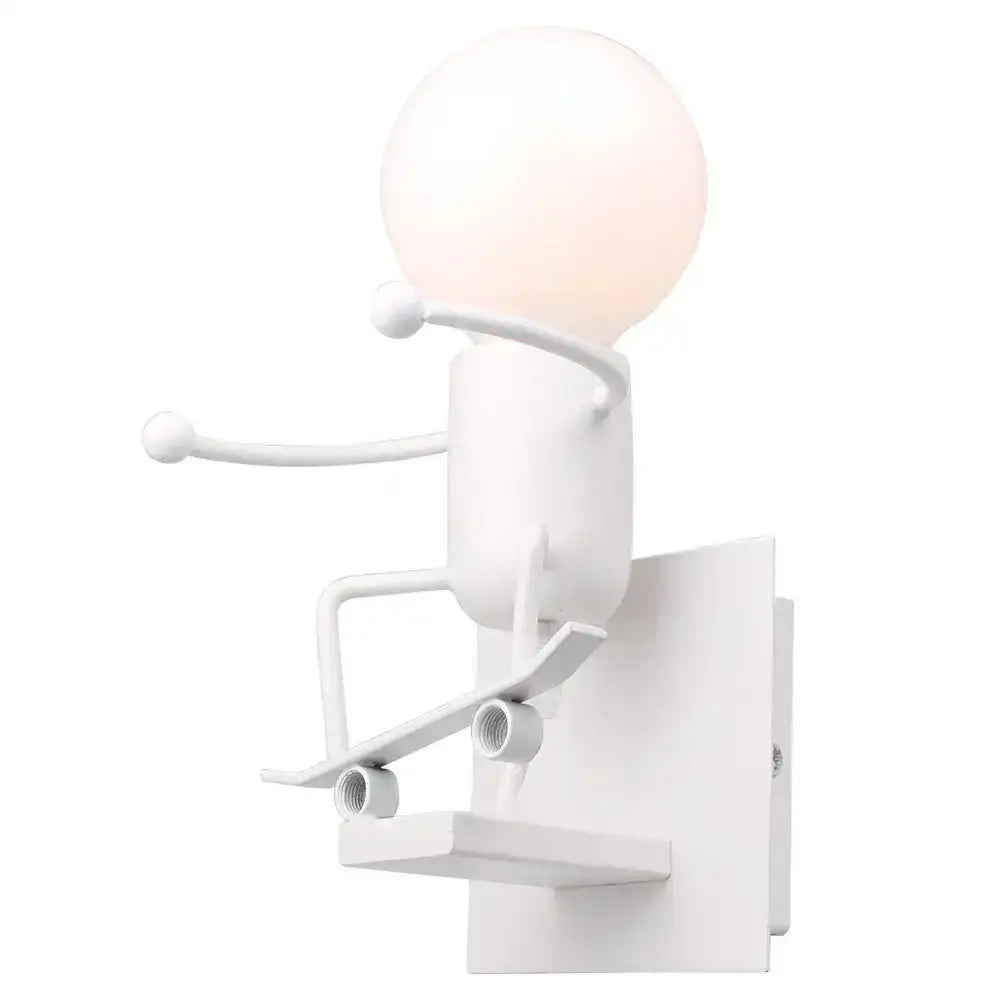 Modern black iron creative led wall sconce features a white minimalist figure holding a spherical bulb for bedroom decorbites creative led decor