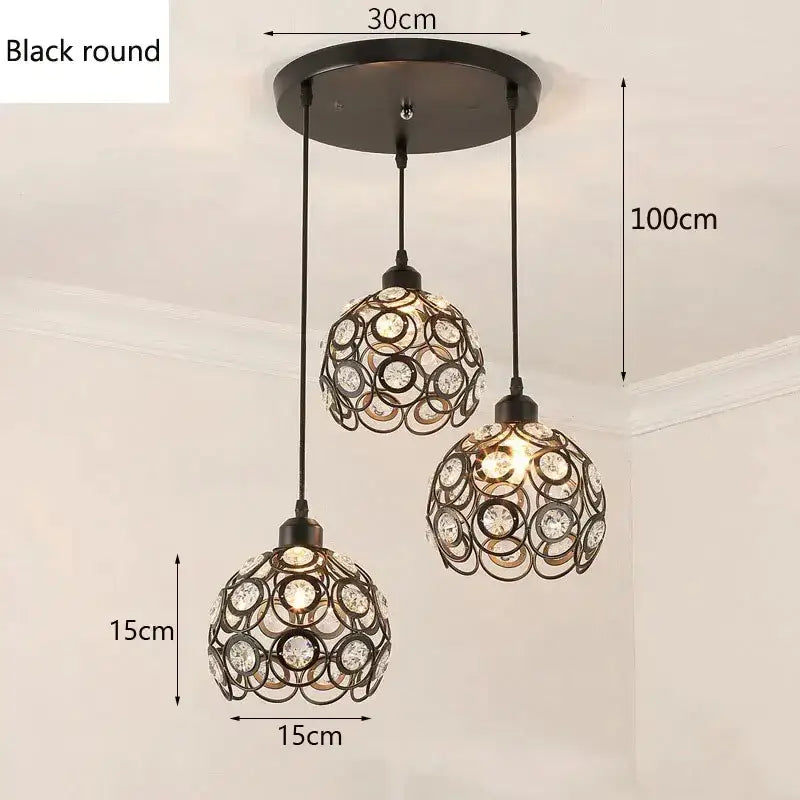 Modern black iron crystal triple pendant lamp with three spherical shades featuring intricate metalwork for dining room decorbites crystal triple pendant