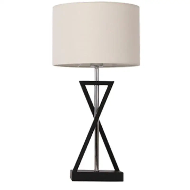Modern black iron table lamp with cream fabric shade and geometric base ideal for bedroom decorbites iron table design