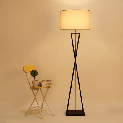 Modern black iron table lamp with off-white fabric shade for bedroom featuring Decorbites iron table design