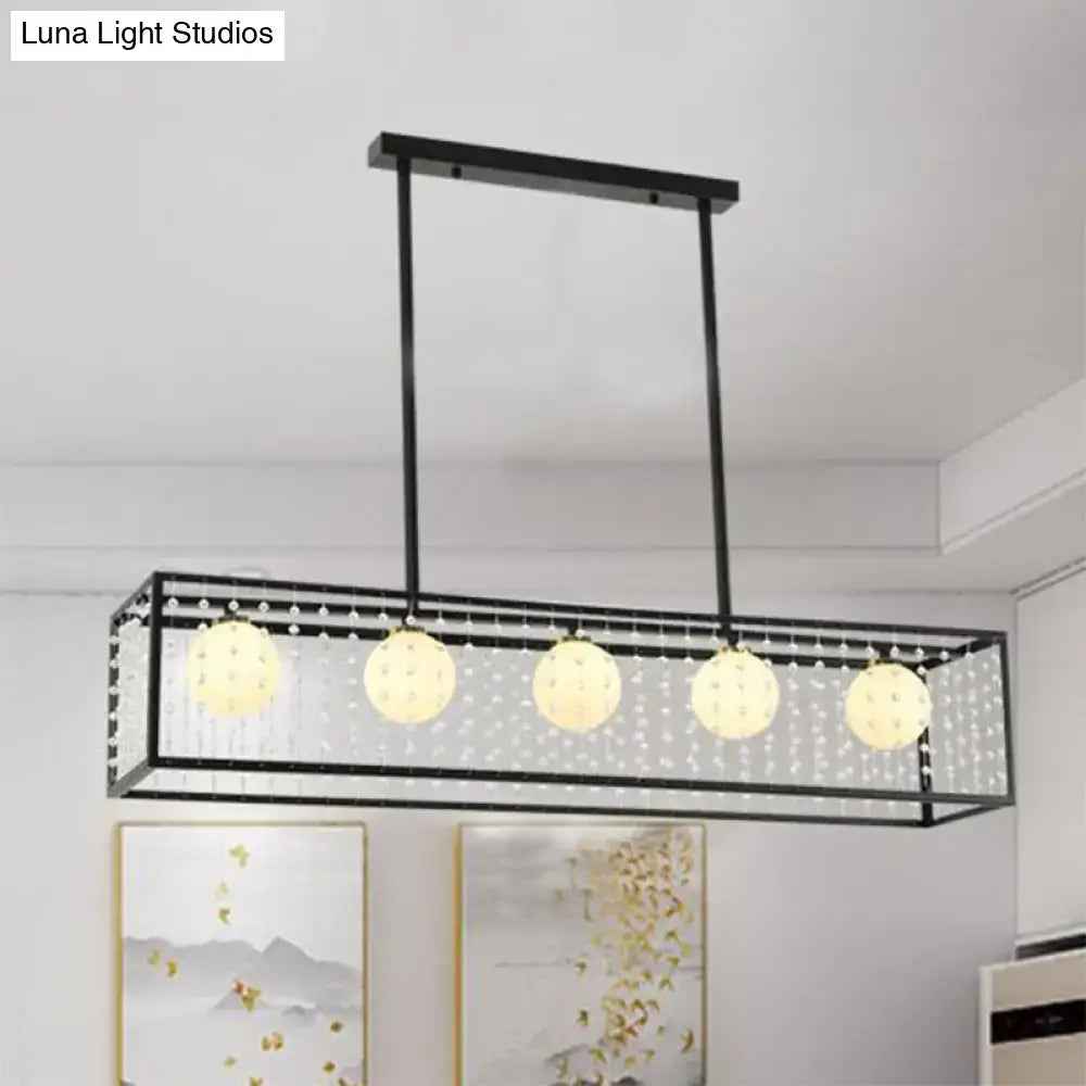 DecorBites™ modern black metal island light with five white glass spherical lights and crystal bead accents ceiling light