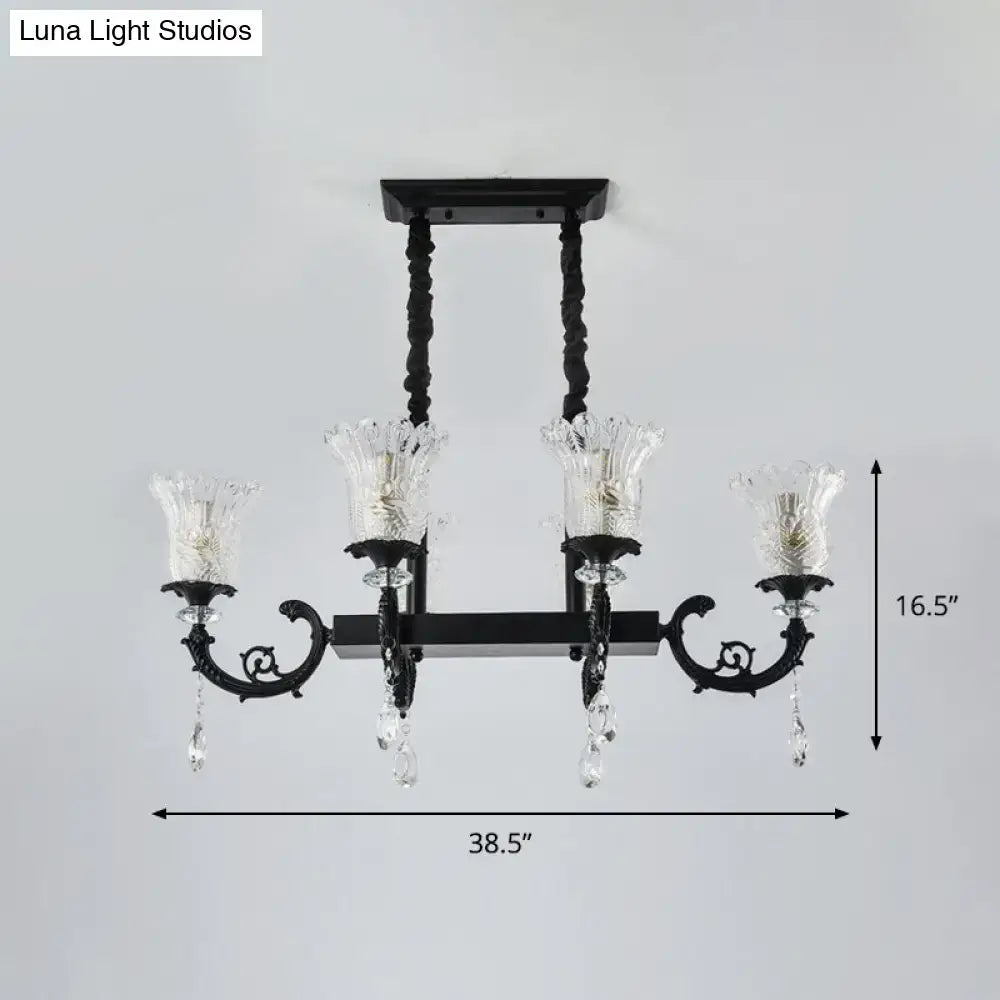 Black wrought iron island pendant lamp with clear crystal droplets and glass candle-style shades for dining room