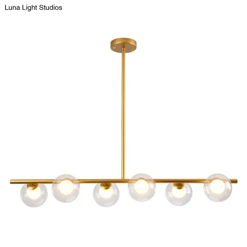 Modern black gold island pendant with five clear glass globe bulbs for dining room lighting fixtures