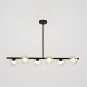 Modern black island pendant with clear glass globes featuring five black gold globe bulbs for dining room lighting