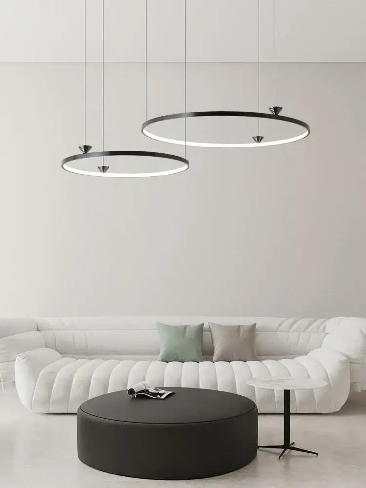 Modern black italian style annular pendant lamp with sleek minimalist design for dining room decorbites italian style