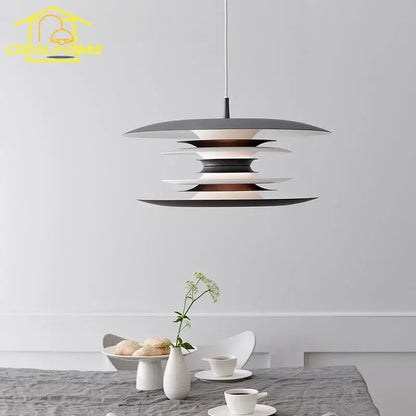 Modern black layered iron art flying pendant light with matte black and white concentric rings for dining room decorbites iron art