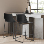 Modern black leather bar stools with gold stitching for kitchen island - Decorbites