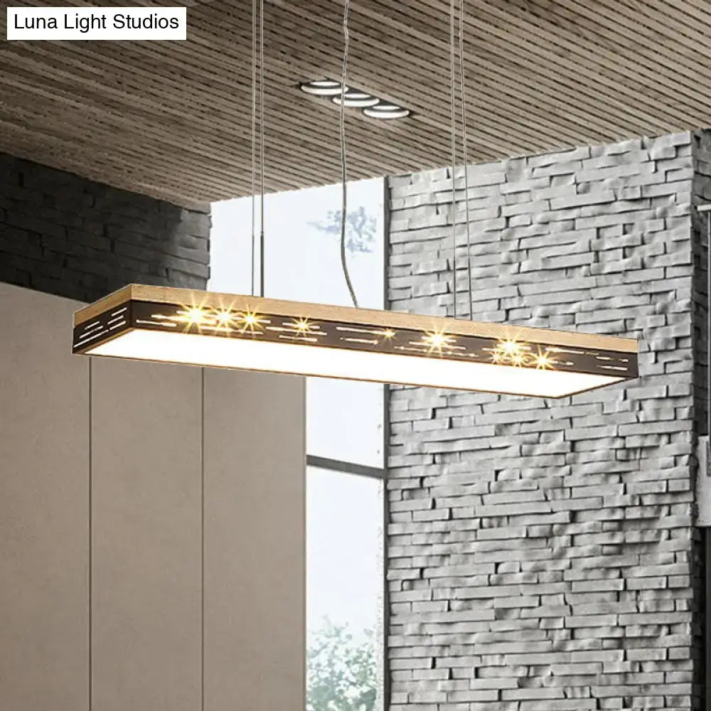 Modern rectangular pendant light by decorbites with warm glow, wooden frame, black metal accents, compatible with 110v-120v bulb base