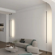 Modern black led pendant light with sleek vertical rods and warm illumination for dining room decorbites black modern design