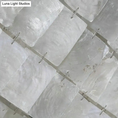 Decorbites modern led shell black island light fixture with translucent white selenite panels and silver metal fasteners