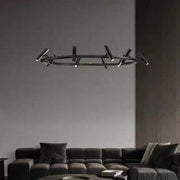 Modern black led spot chandelier with a circular metal frame and multiple angled light fixtures for living room decorbites black led