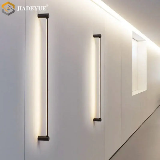 Modern black led strip wall lamp with sleek vertical design and warm ambient glow for minimalist living room decorbites wall lamp
