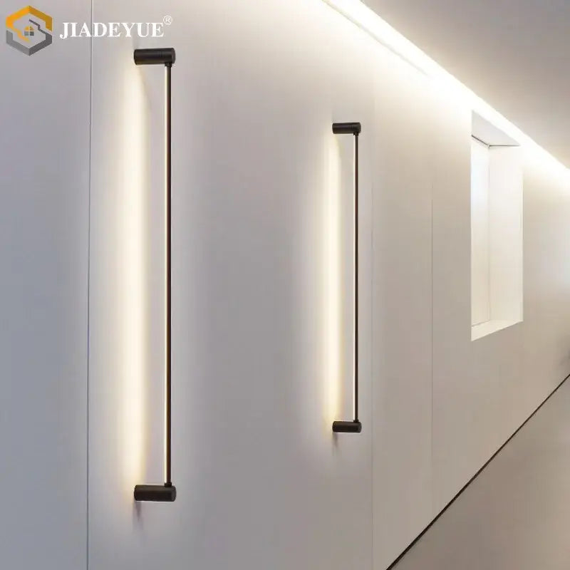 Modern black led strip wall lamp with sleek vertical design and warm ambient glow for minimalist living room decorbites wall lamp