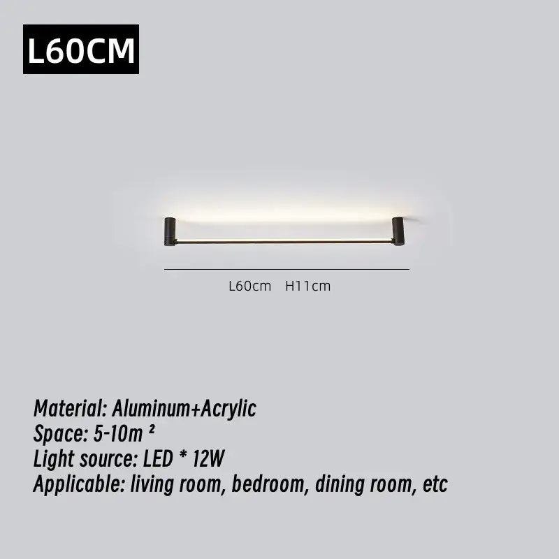 Modern black led strip wall lamp with sleek aluminum and acrylic design and black end caps emitting soft white light