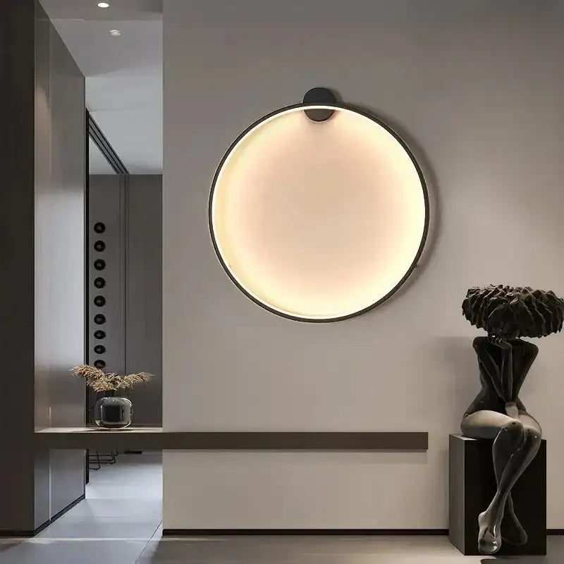 Modern black led wall circle light with a sleek frame and warm diffused glow for living room wall circle lights
