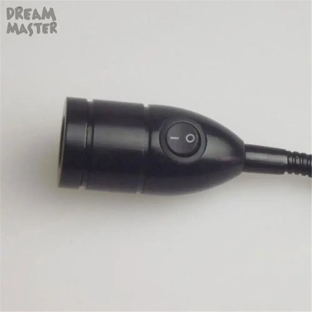 Modern black led wall lamp with adjustable gooseneck and power switch on handheld endoscope handle